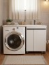 Тумба под стиральную машину напольная Uperwood Magenta 55х50х76,5 см, белая/графит, с дверцами